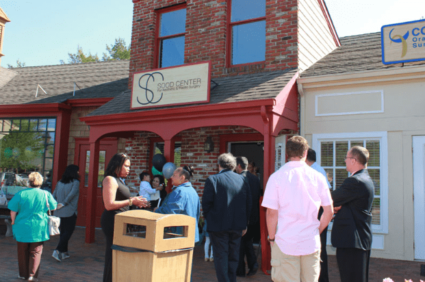 Wideshot of Office Entrance with Guest for Opening Event - A
