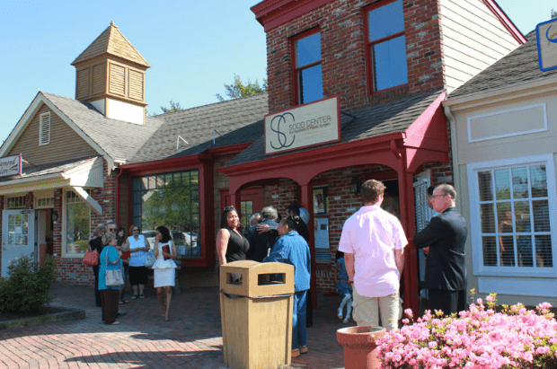 Wideshot of Office Entrance with Guest for Opening Event - B