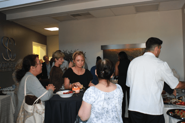 Opening Event Guests Conversing with Drinks - C