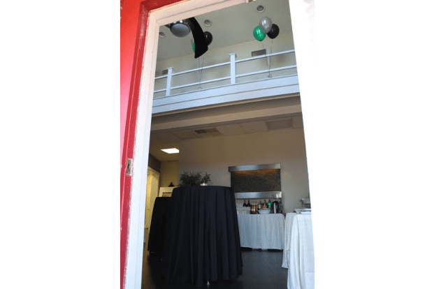 Entrance of Office Showing Tables and Balloons for Grand Opening