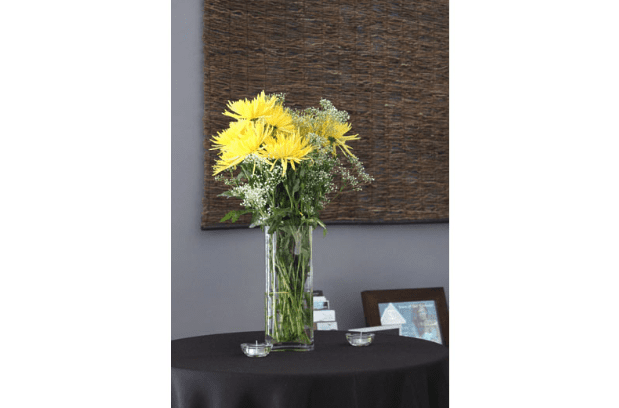 Yellow Flowers on Table for Grand Opening